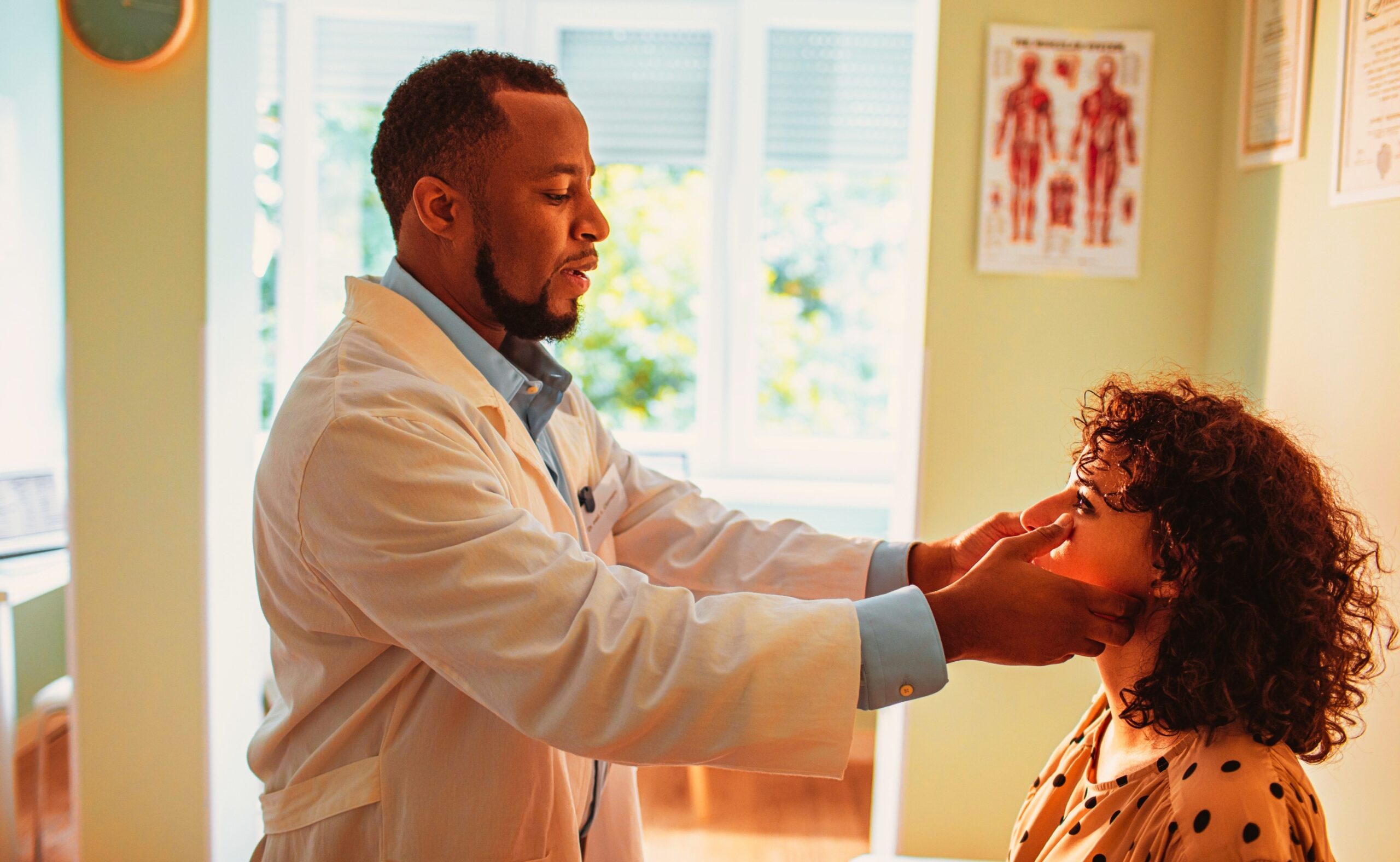 a doctor examining a female patient