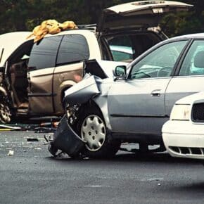 A two vehicle motor vehicle accident with police on scene.