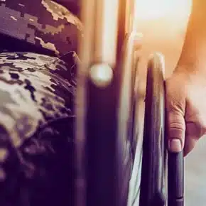 Disabled Soldier In A Wheelchair.