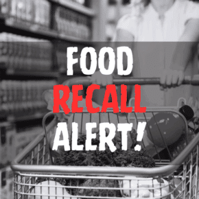 Defocused blur buying milk put on shelf in supermarket with food recall texts.