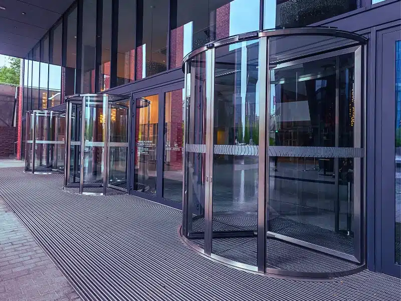 Facade of modern Business Center with glass doors.