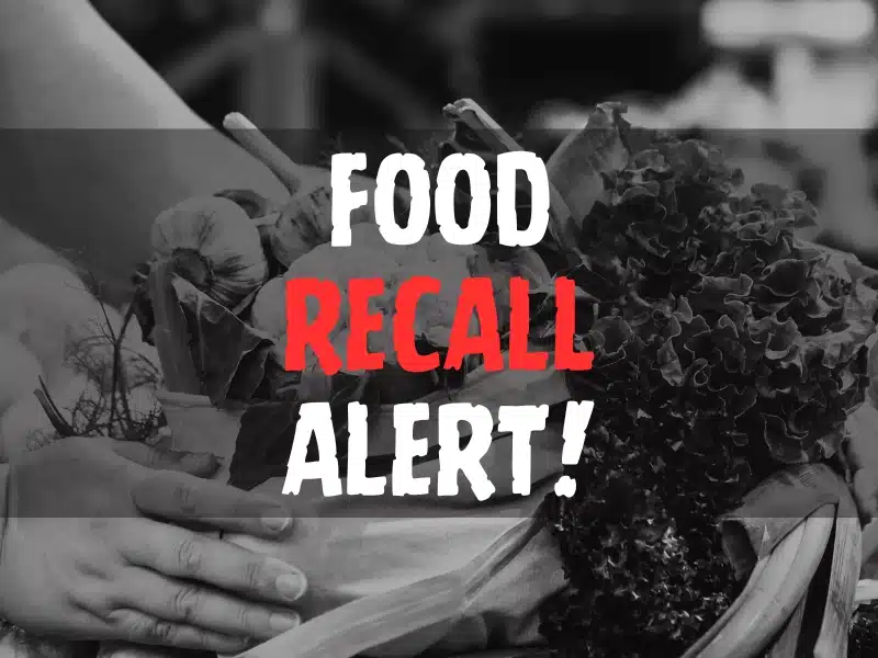 Food Recall Alert text overlay on image of hands holding a basket of fresh vegetables.