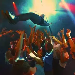 A band playing on stage at a concert. Nightclub & Bar Injuries