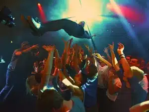 A band playing on stage at a concert. Nightclub & Bar Injuries